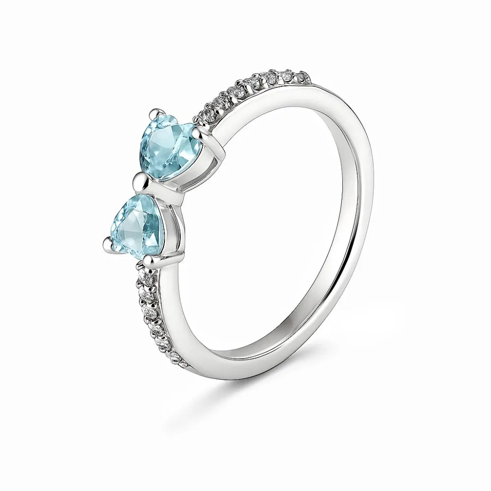 Кольцо из серебра с топазом Sky Blue и фианитами