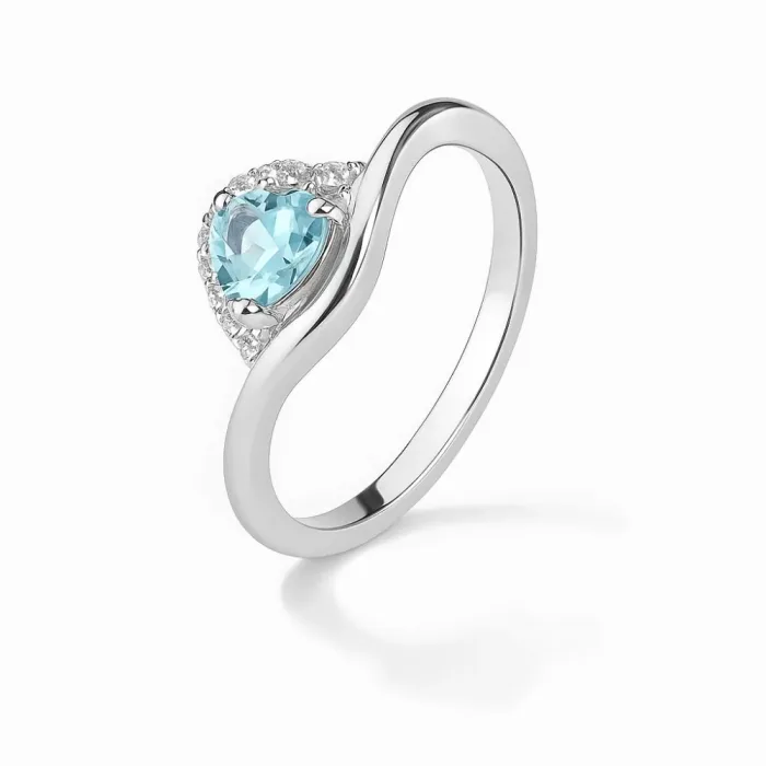 Кольцо из серебра с топазом Sky Blue и фианитами