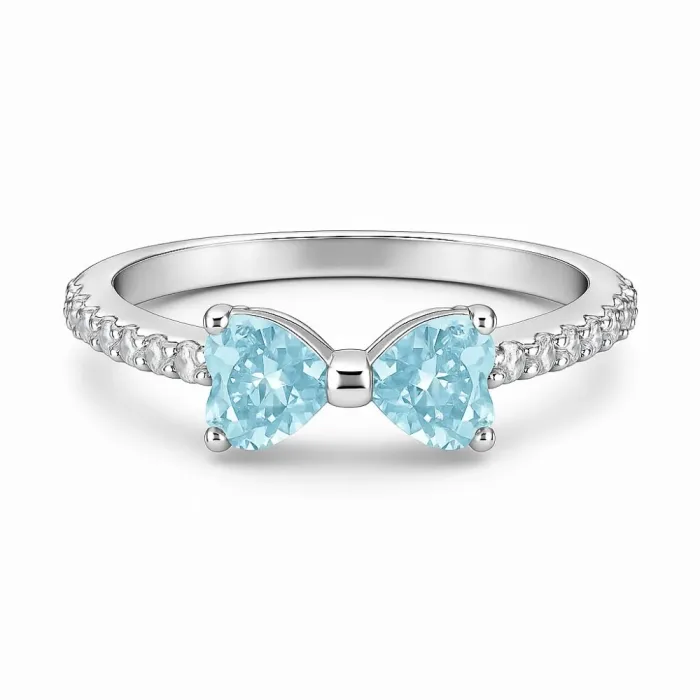 Кольцо из серебра с топазом Sky Blue и фианитами